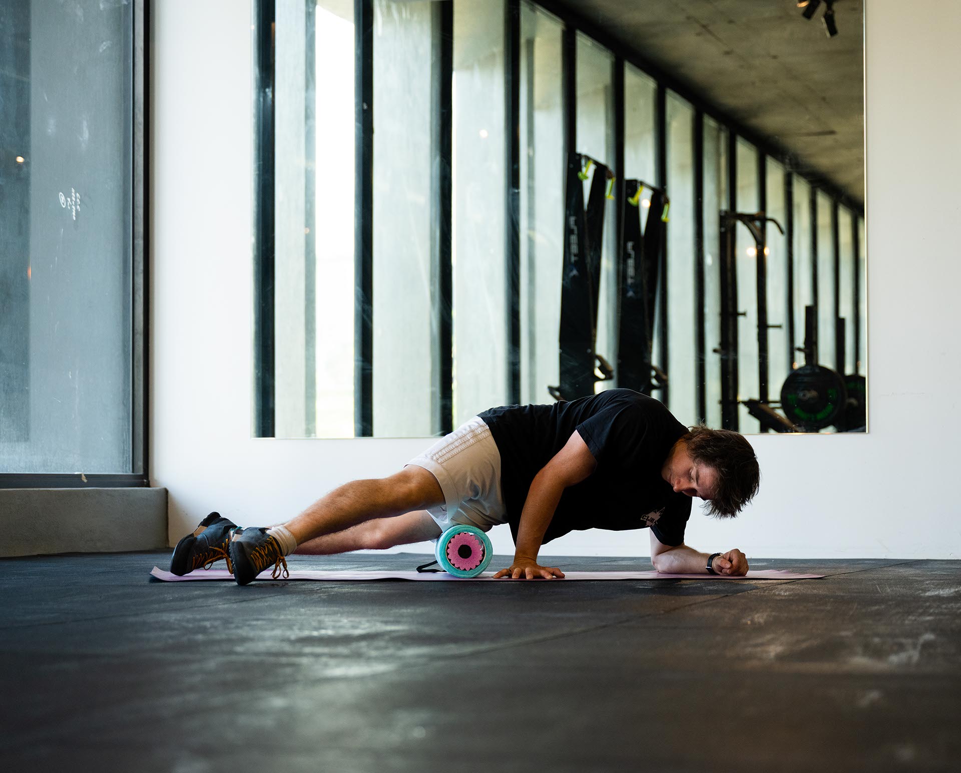 man on foam roller at climbfit